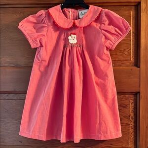 Delaney Res Gingham Santa dress
4T